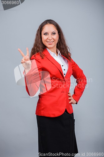 Image of Young attractive girl in red with folders