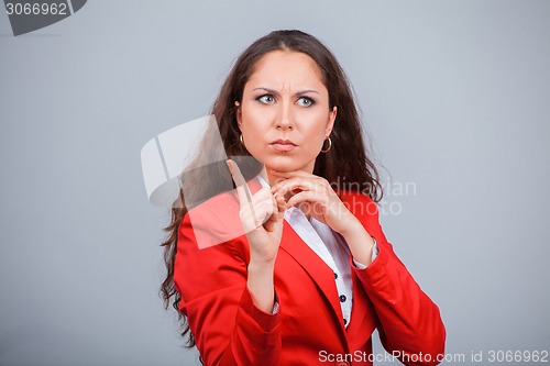 Image of Young attractive girl in red with folders