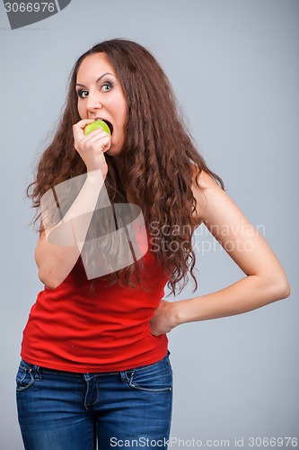 Image of Smiling Girl and apple