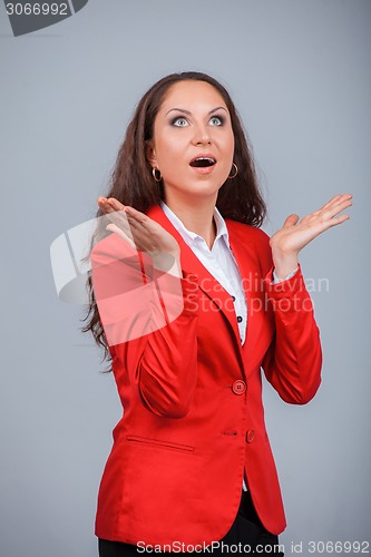 Image of Young attractive girl in red with folders