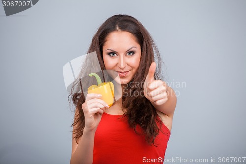 Image of Woman with bell pepper