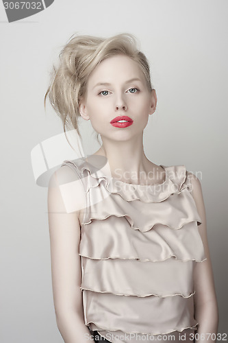 Image of fashion blond girl with red lips