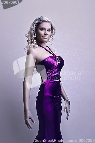 Image of attractive blond girl in purple dress