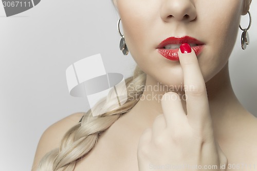 Image of Close-up photo of a beautiful red female lips