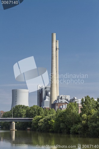 Image of power plant at german river with blue sky