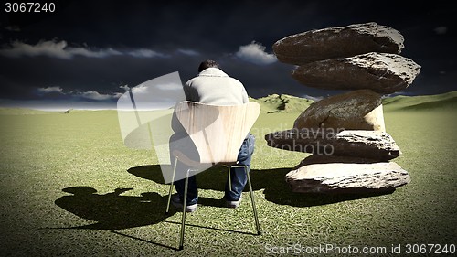 Image of Young man  talking on his mobile 