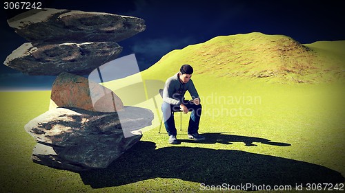 Image of Young man  talking on his mobile 