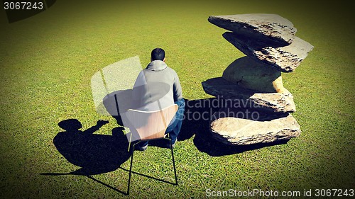 Image of Young man  talking on his mobile 