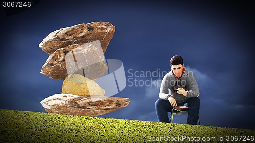 Image of Young man  talking on his mobile 