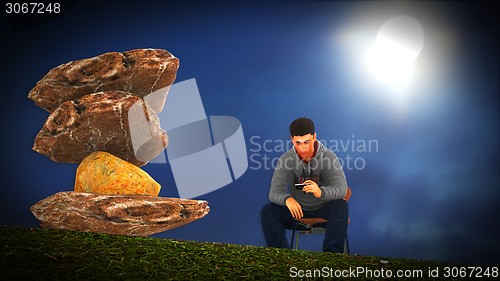 Image of Young man  talking on his mobile 