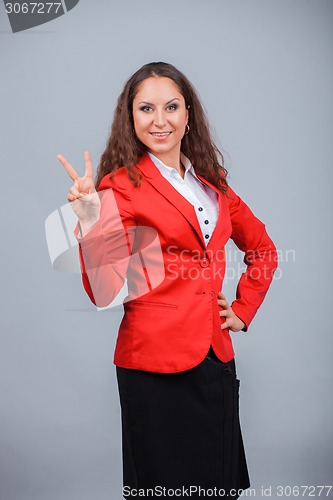 Image of Young attractive girl in red with folders
