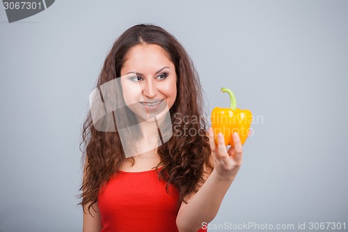 Image of Woman with bell pepper