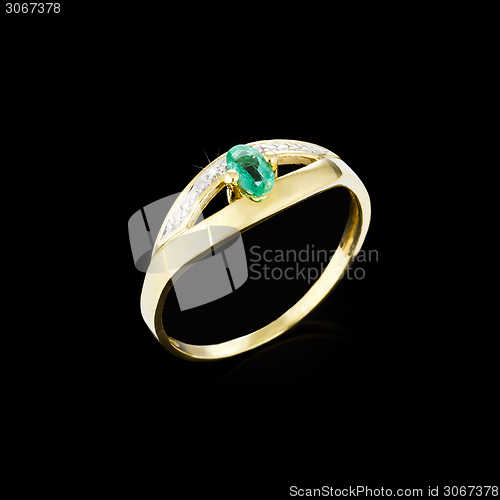 Image of Gold Diamond ring on black background