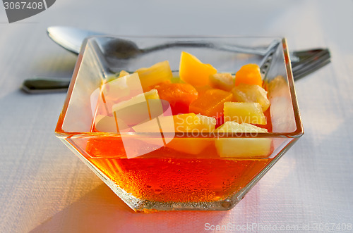 Image of Dessert: fruit pieces in a sugar syrup.