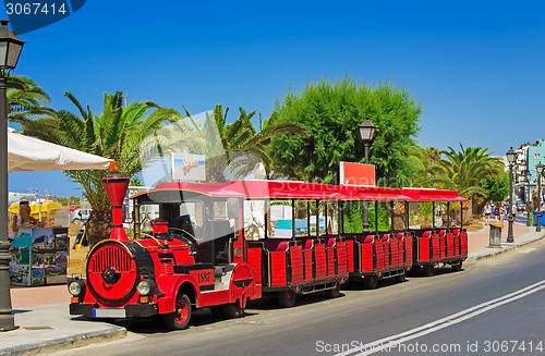 Image of The car in the style of an old steam locomotive in the resort to