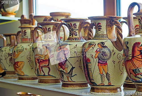 Image of Ceramic vases with painted antique subjects.