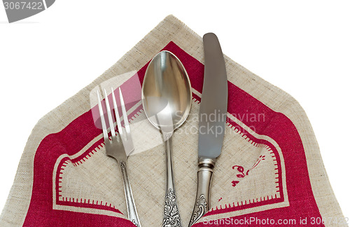 Image of Cutlery : knife, fork, spoon on a white background.