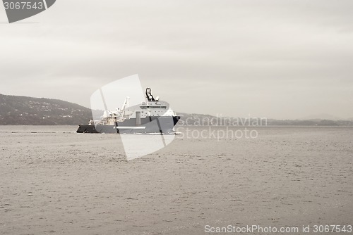 Image of Cargo vessel is coming to port