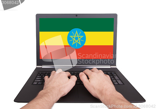 Image of Hands working on laptop, Ethiopia