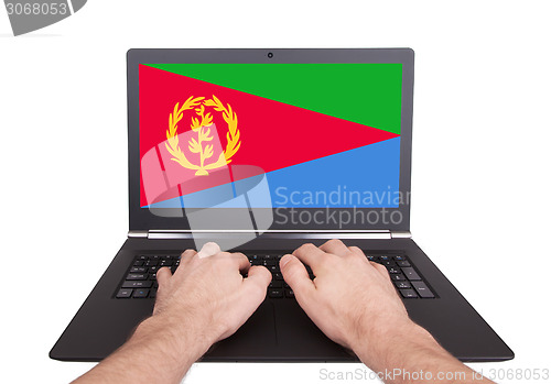 Image of Hands working on laptop, Eritrea