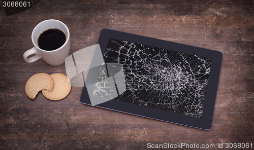 Image of Tablet computer with broken glass