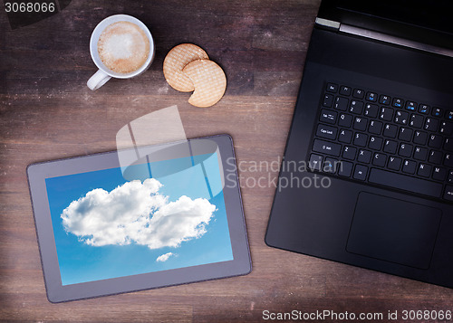 Image of Cloud-computing connection on a digital tablet pc