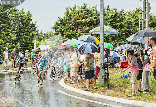 Image of The Peloton in a Rainy Day