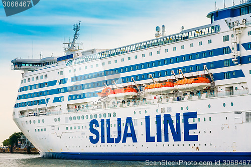 Image of Modern ferry boat "Silja Line" at pier awaiting loading cargo fr