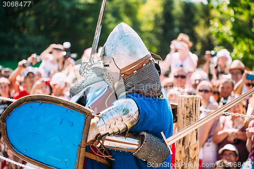 Image of Knights In Fight With Sword. Restoration Of Knightly Battle