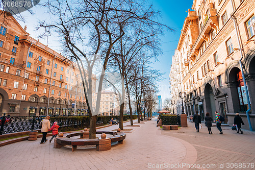 Image of People walking on the sidewalk on Lenin Street in spring in Mins