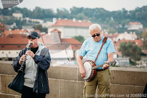 Image of Street Buskers performing jazz songs on the Charles Bridge in Pr