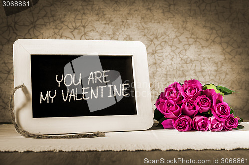 Image of slate blackboard valentine and roses