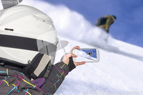 Image of Photographed snowboarder freerider in the mountains