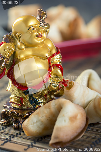 Image of Laughing Buddha and the Chinese cookies.