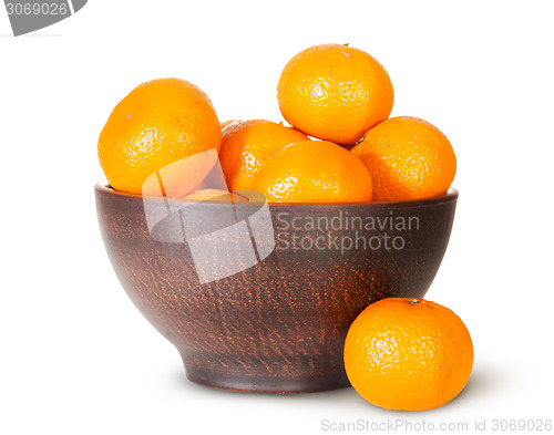 Image of Tangerines In A Ceramic Bowl And One Near