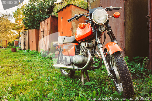 Image of Vintage Red Motorcycle Generic Motorbike In Countryside