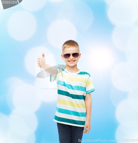 Image of smiling cute little boy in sunglasses