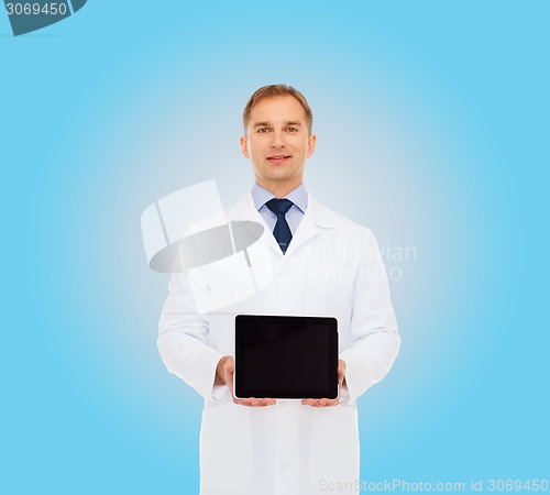 Image of smiling male doctor with tablet pc