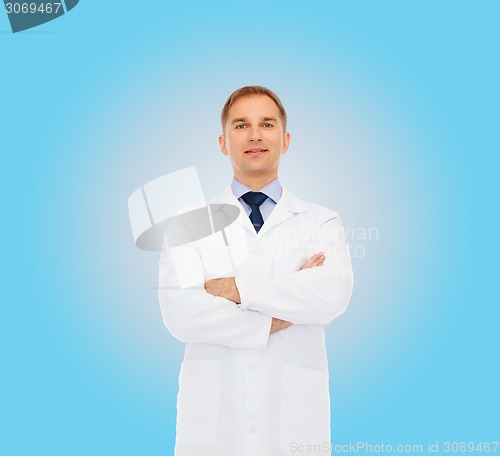 Image of smiling male doctor in white coat