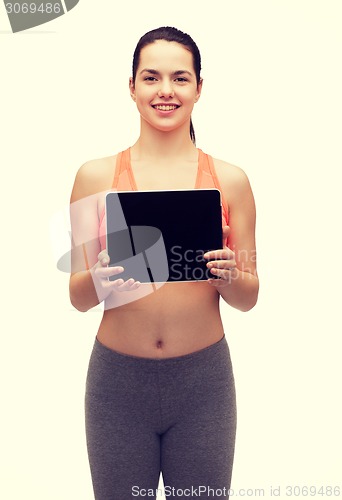 Image of sporty woman with tablet pc blank screen