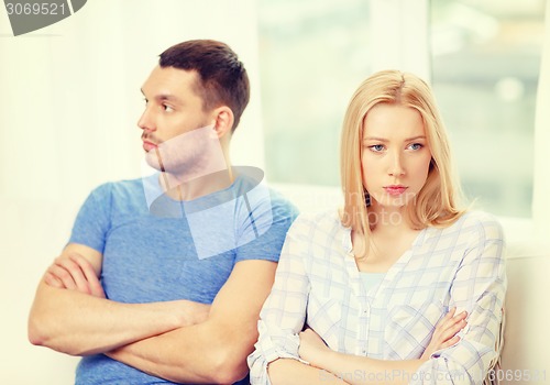 Image of unhappy couple having argument at home