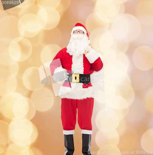 Image of man in costume of santa claus with bag