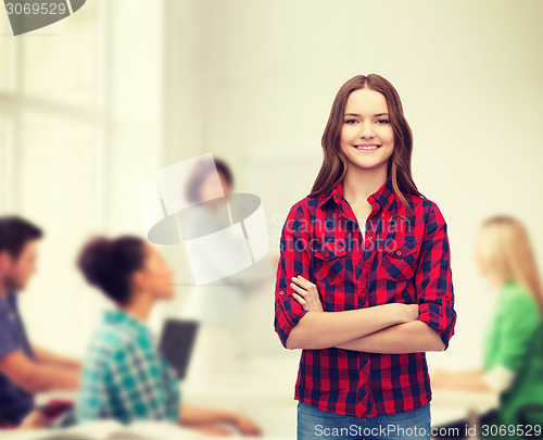 Image of smiling young woman in casual clothes