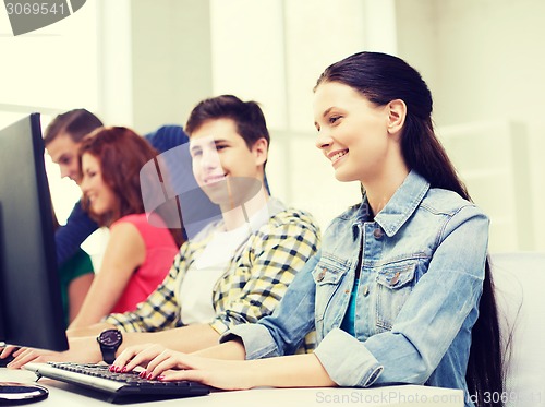 Image of group of smiling students having discussion