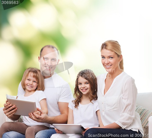 Image of happy family with tablet pc computers