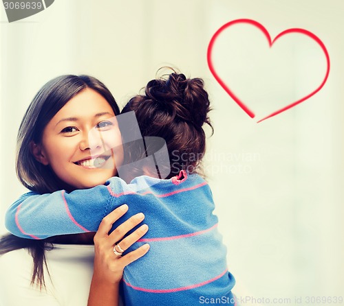 Image of hugging mother and daughter