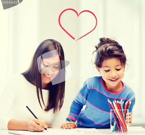 Image of mother and daughter drawing