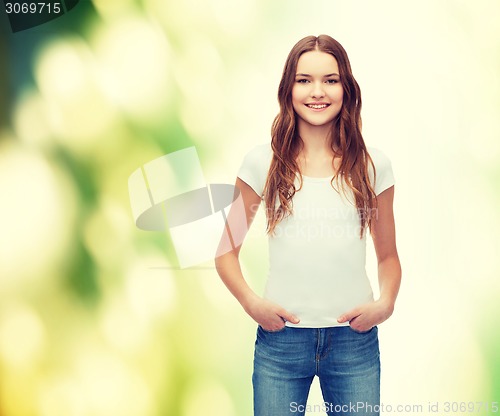 Image of smiling teenager in blank white t-shirt