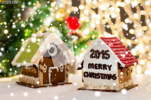 Image of closeup of beautiful gingerbread houses at home