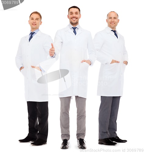 Image of smiling male doctors in white coats